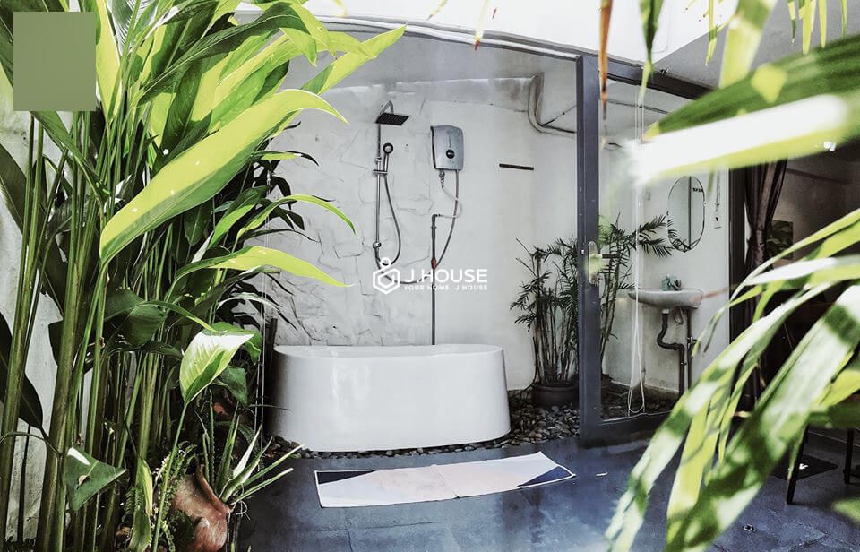 Stylish studio with tropical garden, outdoor bathtub