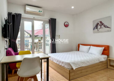 Studio apartment with long balcony at Cactus Building, District 1