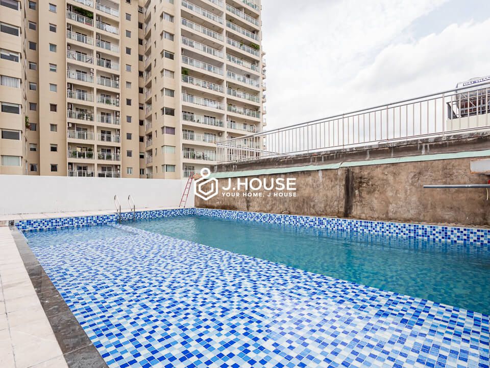 rooftop swimming pool at serviced apartment building