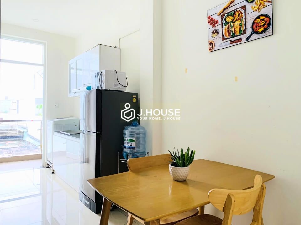 bright one bedroom serviced apartment for rent in tan binh district-3
