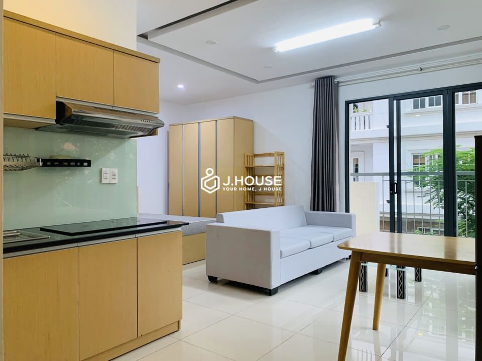 Bright serviced apartment with long balcony and rooftop swimming pool in Thao Dien, District 2