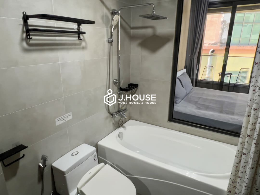Modern studio apartment for rent with balcony at AV House, District 3, HCMC