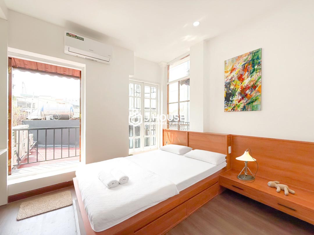 Bright 2-Bedroom Serviced Apartment for Rent in District 1 - QK Building-0