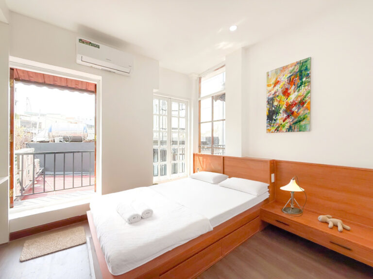 Bright 2-Bedroom Serviced Apartment for Rent in District 1 - QK Building-0