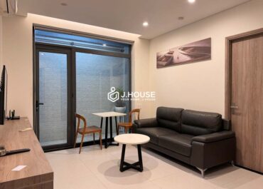 Modern living room in ground floor apartment District 1