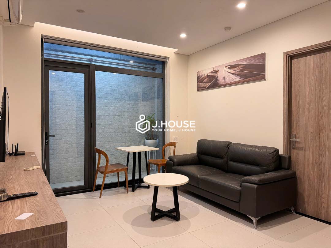 Modern living room in ground floor apartment District 1