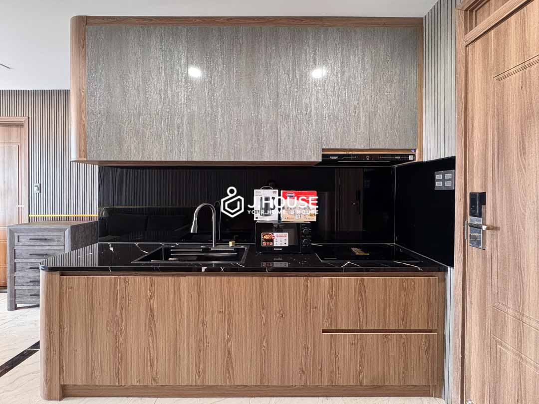 Smart kitchen design and mini storage in Vitaminsea Apartment Thao Dien