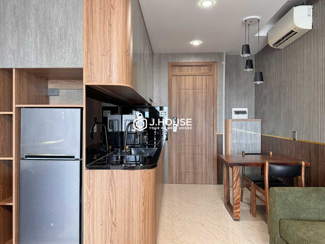 Smart kitchen design and mini storage in Vitaminsea Apartment Thao Dien